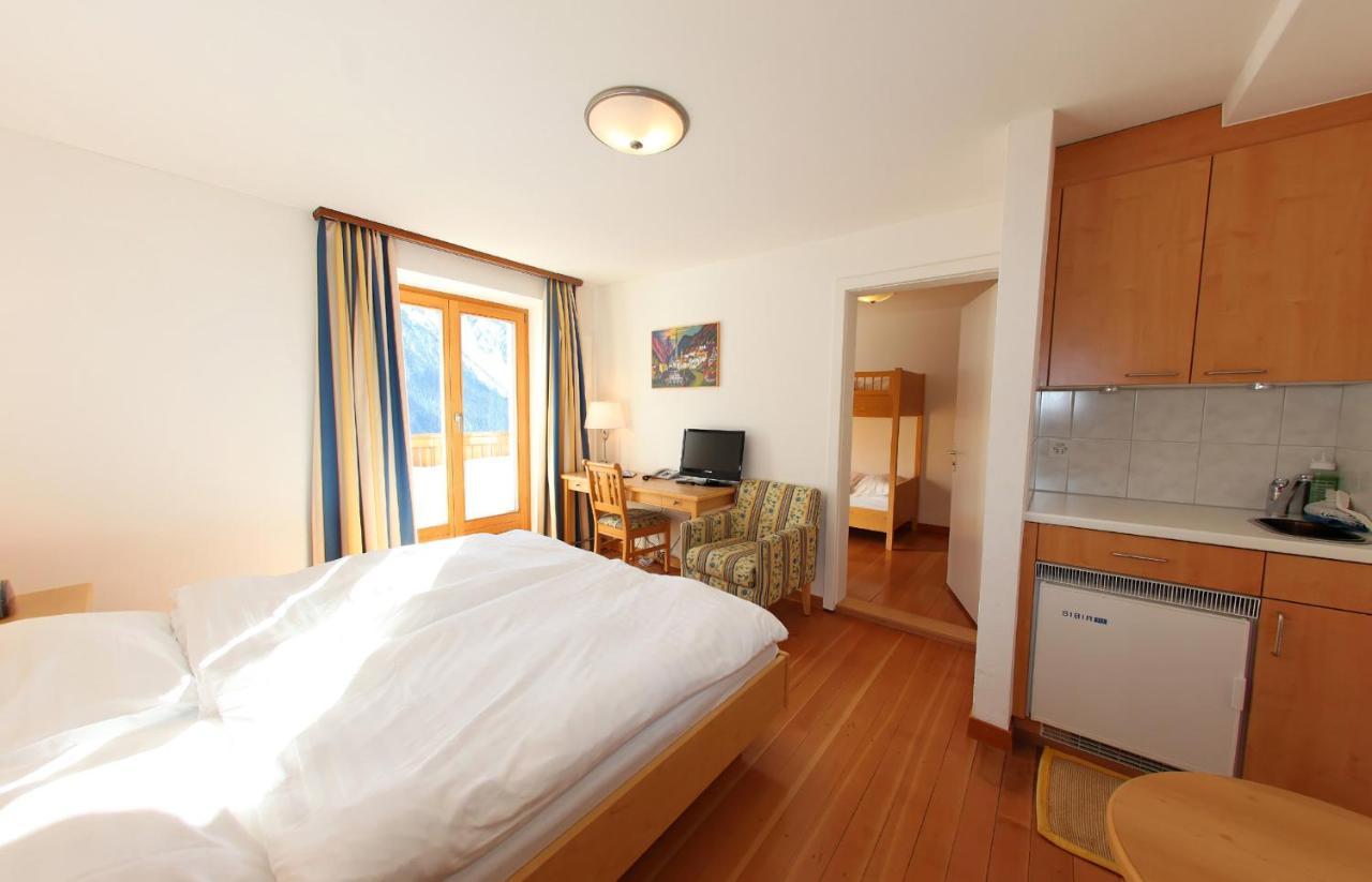 Aparthotel Muchetta Wiesen Bagian luar foto
